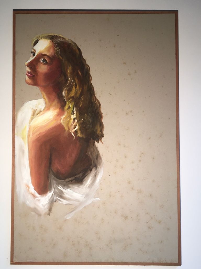 Painting by Jasmin Southgate: a woman looking back over a bare shoulder